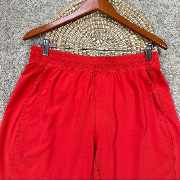 Lululemon Men’s Pace Breaker Linerless Short Pull On 11” Carnation Red-Orange 29 - Picture 2 of 2